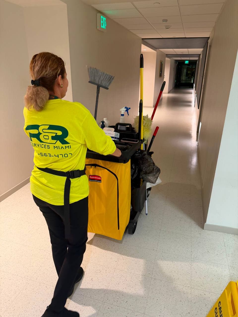 R&R Services Miami team member during a janitorial service at a client facility